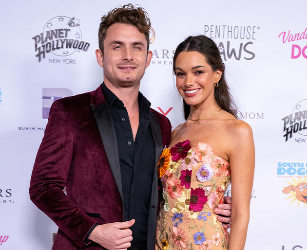 A woman and man posing at the Vanderpump dog Foundation's 6th annual Gala.