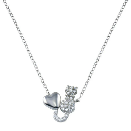 A sterling silver cat and heart necklace featuring a sparkling, cat-shaped pendant whose tail curls up beside a polished heart charm.
