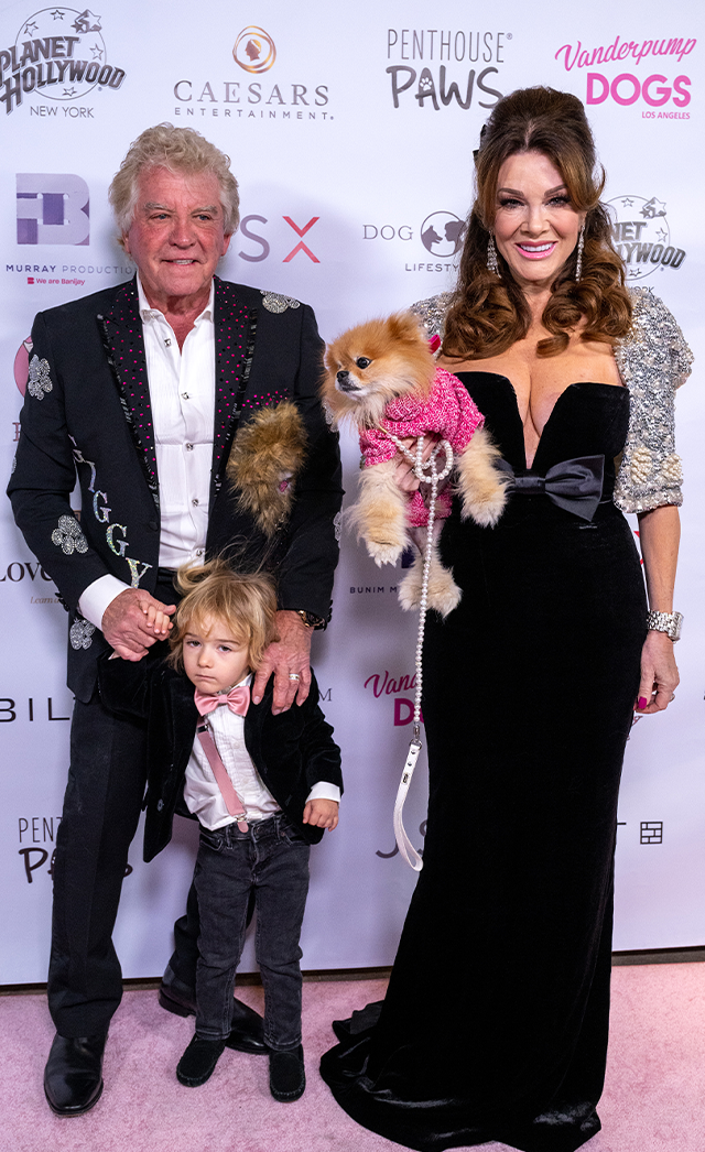 A woman and man posing at the Vanderpump dog Foundation's 6th annual Gala.